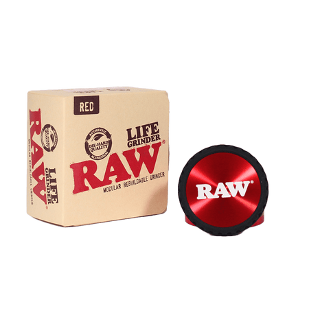 RAW Life Grinder in red with modular design, packaged in box for easy use and maintenance.