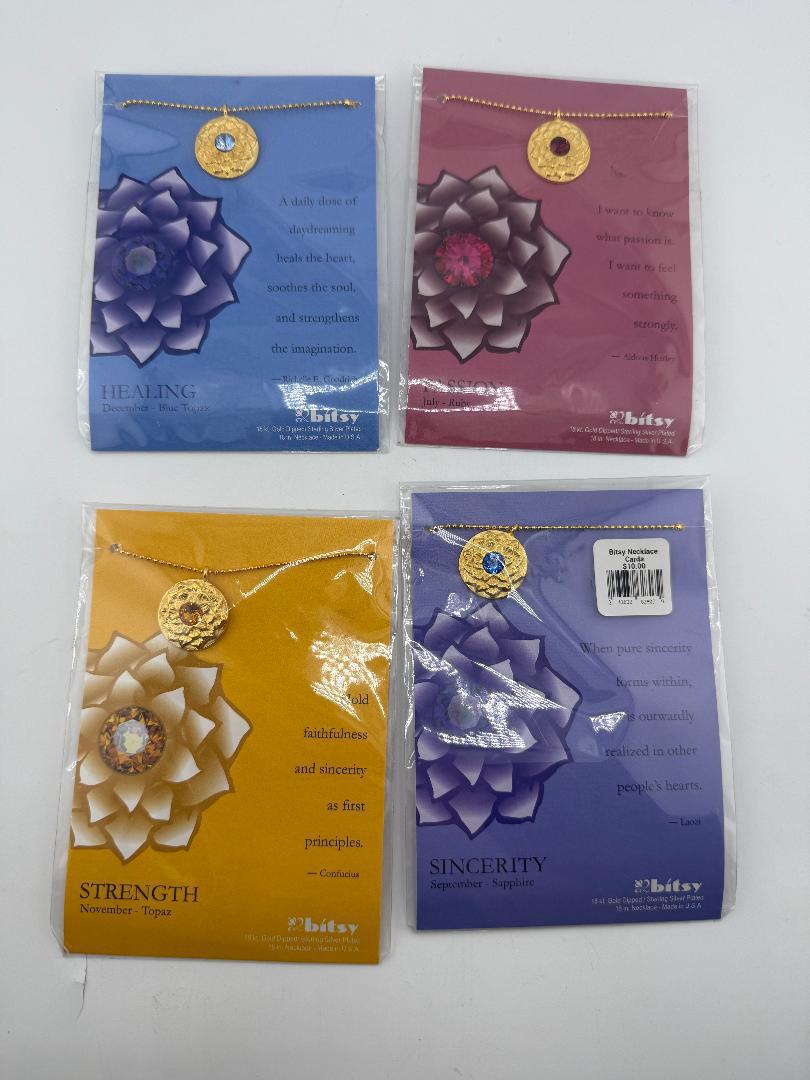 Bitsy Gemstone Birth Month Necklace displayed with four options: Healing, Strength, Sincerity, and corresponding colors.