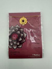 Bitsy Gemstone Birth Month Necklace displayed with July ruby on a decorative card.