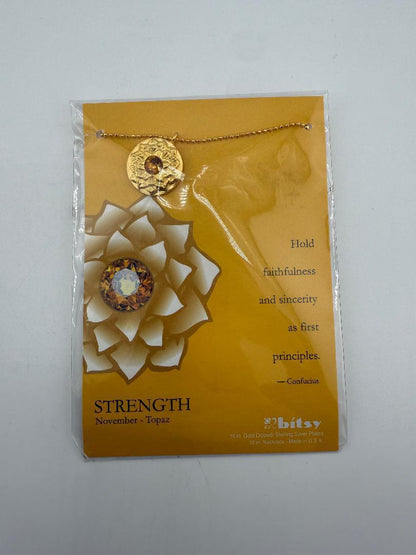 Bitsy Gemstone Birth Month Necklace featuring Topaz for November on an elegant packaging background.