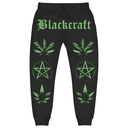 BlackCraft Cult Joggers featuring green Blackcraft logo and occult designs on a black background, perfect for stylish comfort.