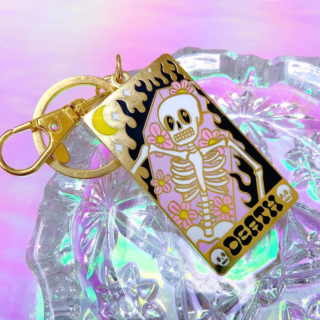 Bobby Pins Co. Keychain - Death Tarot Card featuring a colorful skeleton and floral design.