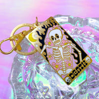 Bobby Pins Co. Keychain - Death Tarot Card featuring a colorful skeleton and floral design.