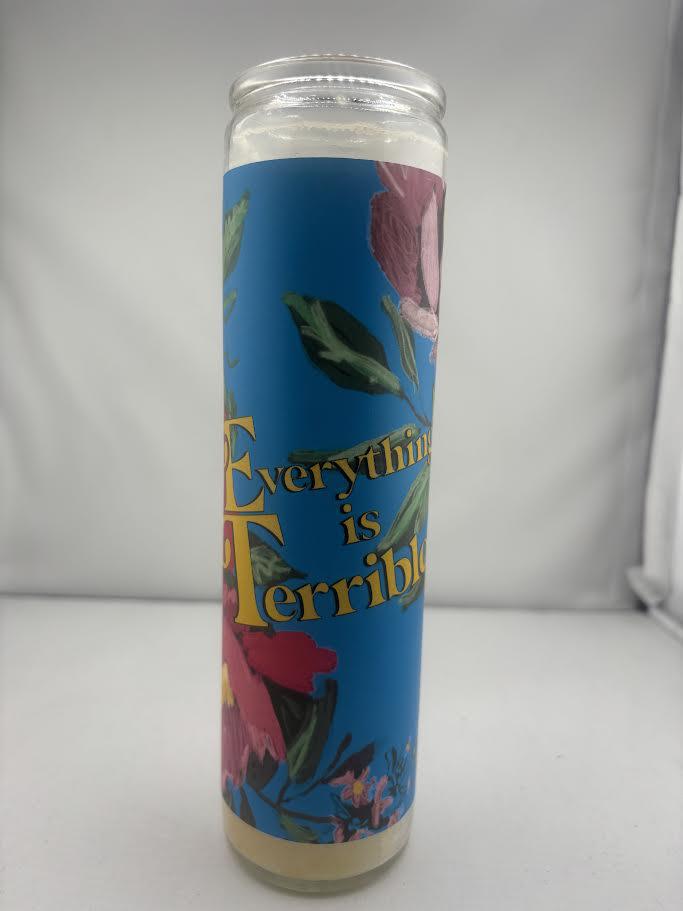 BobbyK Everything is Terrible Candle with floral design on blue background.