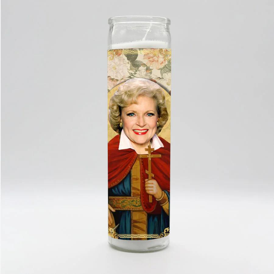 Bobbyk Saint Candles featuring a parody-inspired design of a beloved icon with floral backdrop.