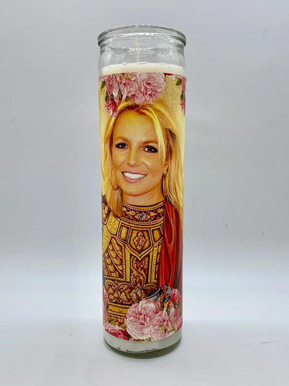 Bobbyk Saint Candles featuring a tall candle with a pop culture icon design and floral accents.
