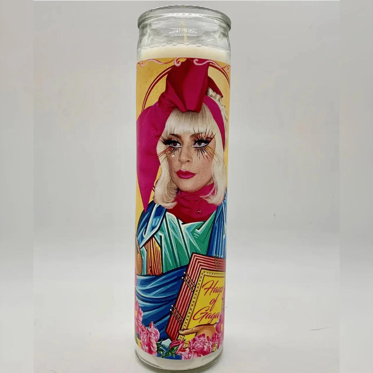 Bobbyk Saint Candles featuring a colorful image of a cultural figure with a prayer candle design.