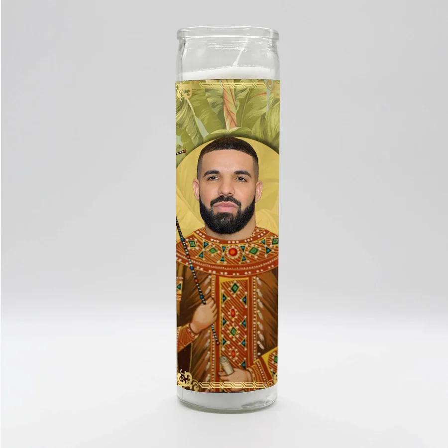 Bobbyk Saint Candles featuring a parody design with a popular music icon on a tall white prayer candle