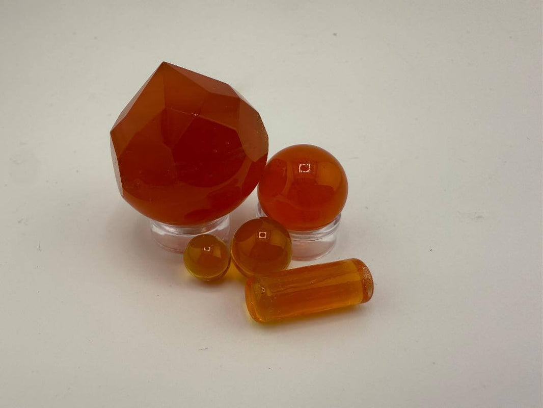 Bowman Glass faceted quartz terp slurper set featuring orange quartz pieces for enhanced dabbing experience.