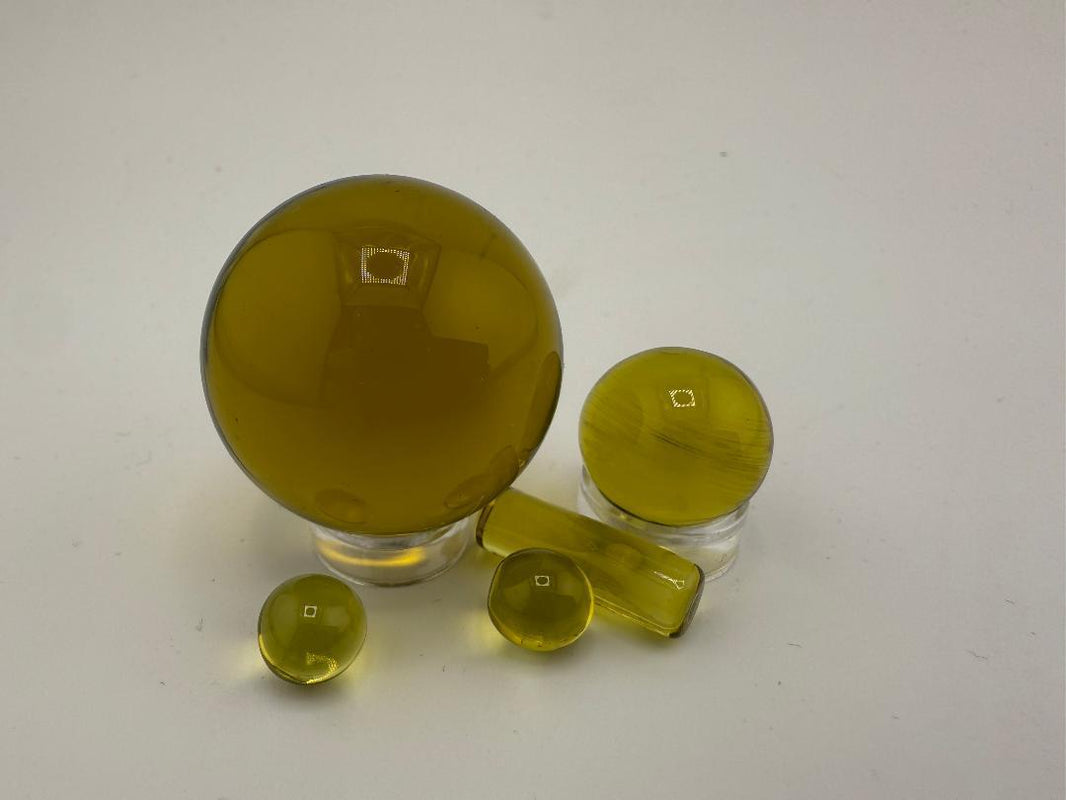 Bowman Glass Oversized Terp Slurper Marble Set in yellow, featuring four uniquely shaped borosilicate glass pieces.