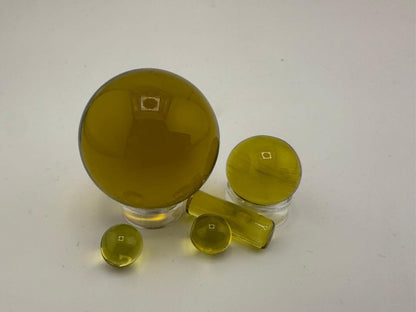 Bowman Glass Oversized Terp Slurper Marble Set in yellow, featuring four uniquely shaped borosilicate glass pieces.