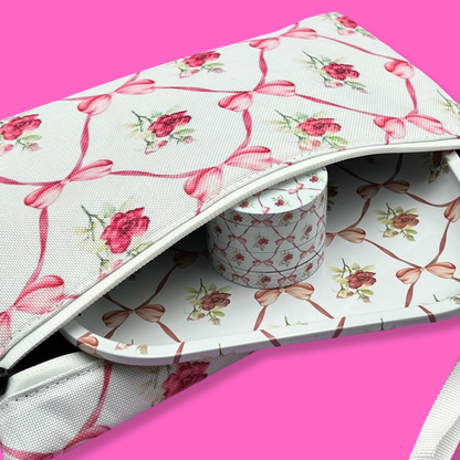 Coming Soon: Bows & Roses 3-in-1 Herb Set – Rolling Tray, Grinder & Travel Bag with floral design and pink ribbons.
