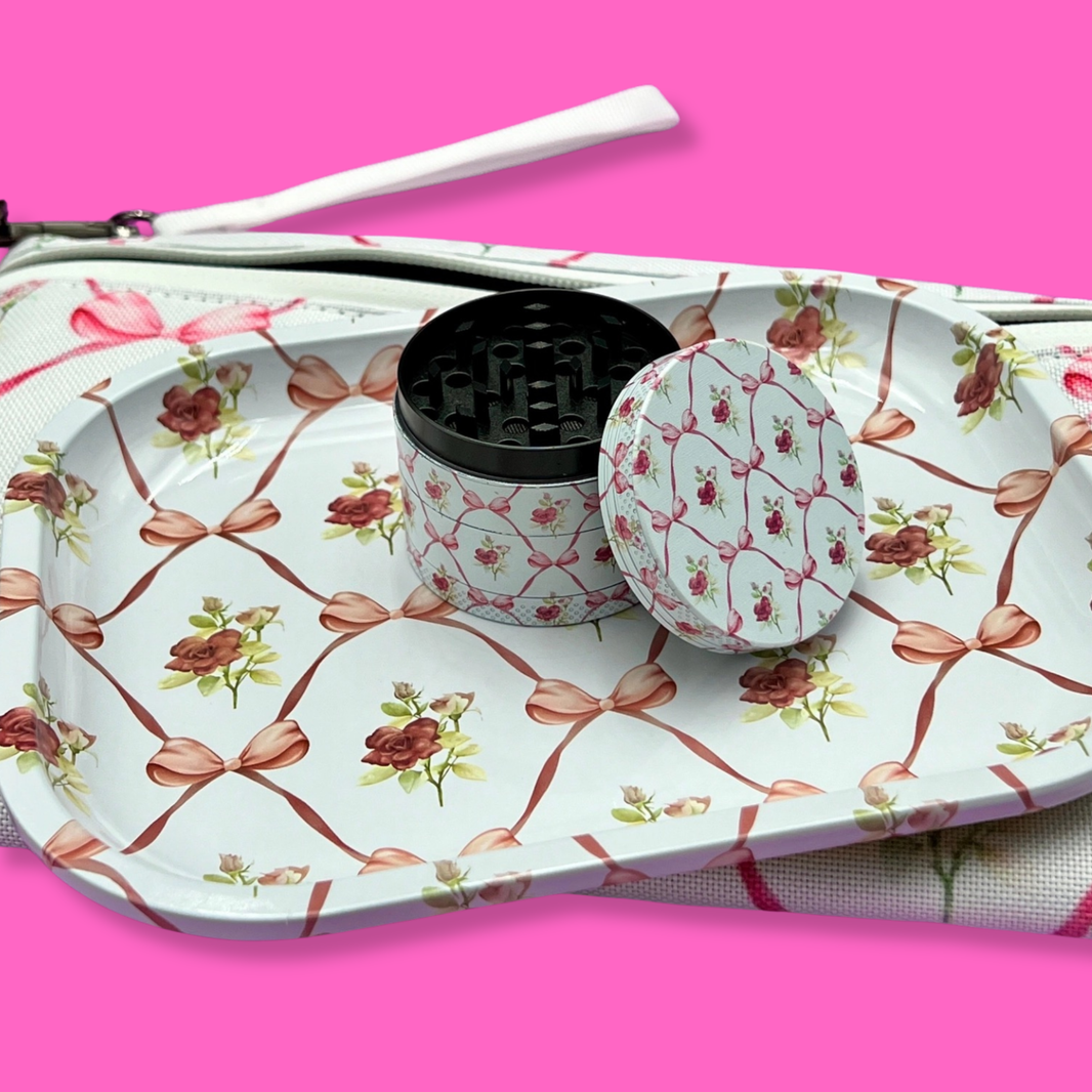 Coming Soon: Bows & Roses 3-in-1 Herb Set – Rolling Tray, Grinder & Travel Bag on a pink background.