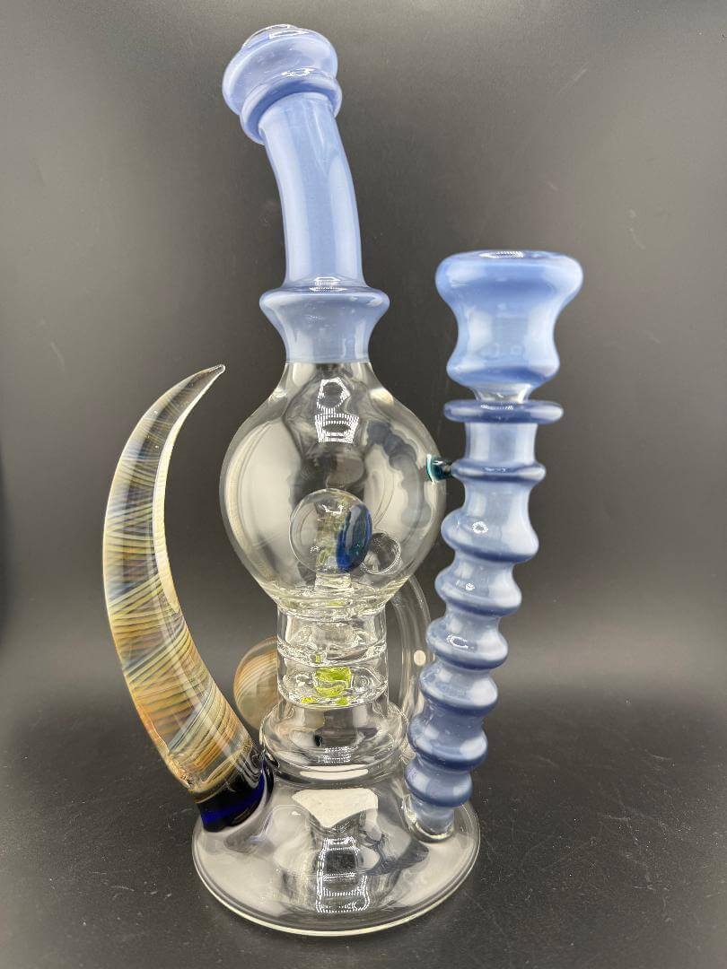 Brando Glass Blooper - Large Format UV Blue w/ Marble Attachments Fumed Horn 14mm 90° displayed in clear glass with blue accents.