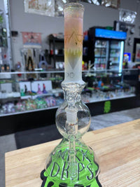 Brando Glass Blooper - Pacific North West Theme Lrg Heavy Fumed 14mm 90° displayed on a wooden surface with vibrant fume work.