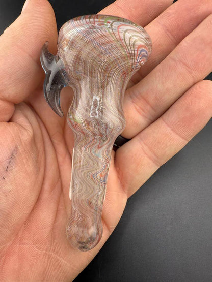 Brando Glass Chillum Pipe -Double Layer Rainbow Linework w/ Blue Horns showcasing vibrant colors and design in hand.