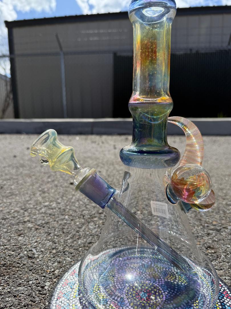 Brando Glass Cold Worked Tube 14mm with colorful accents, handcrafted functional art piece, showcasing unique textures.