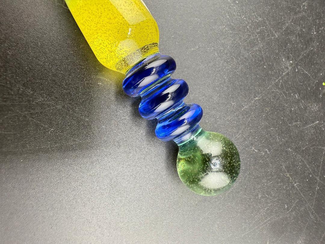 Brando Glass Dab Tool - Green, Blue, and Yellow featuring vibrant colors and handcrafted detail.