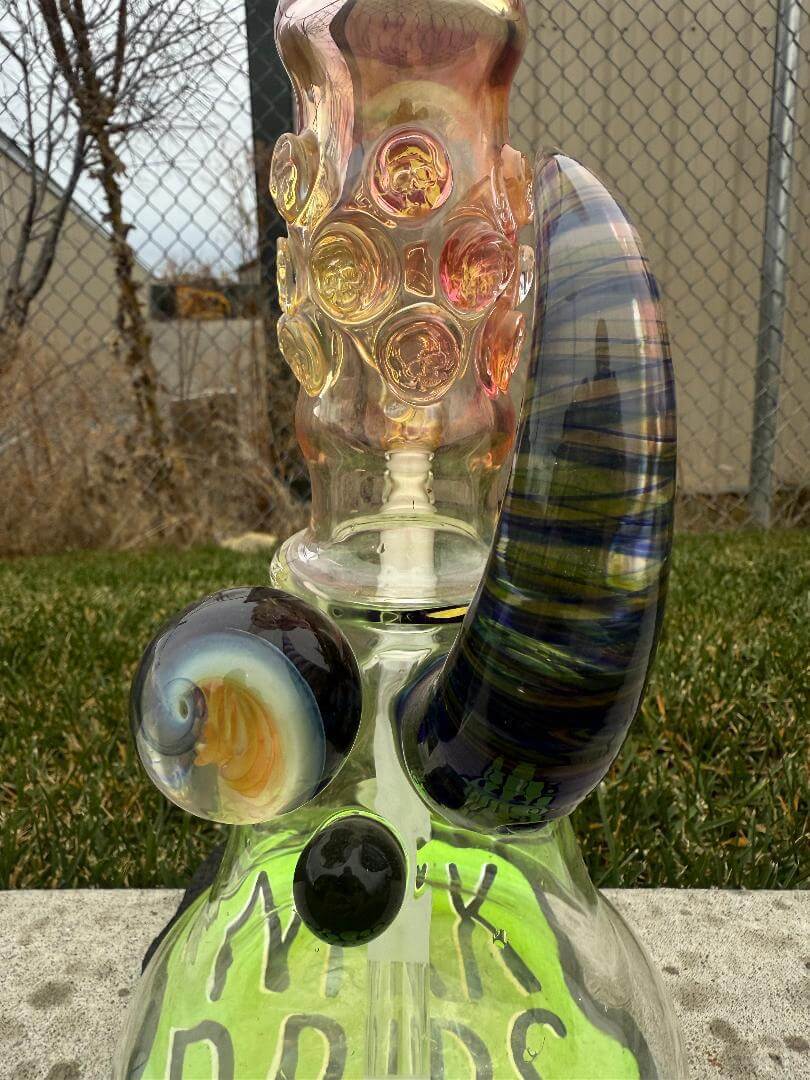 Brando Glass Flower Beaker - 18" Fumed Neck Line Worked Horn 14mm 45° showcasing unique design and vibrant colors.