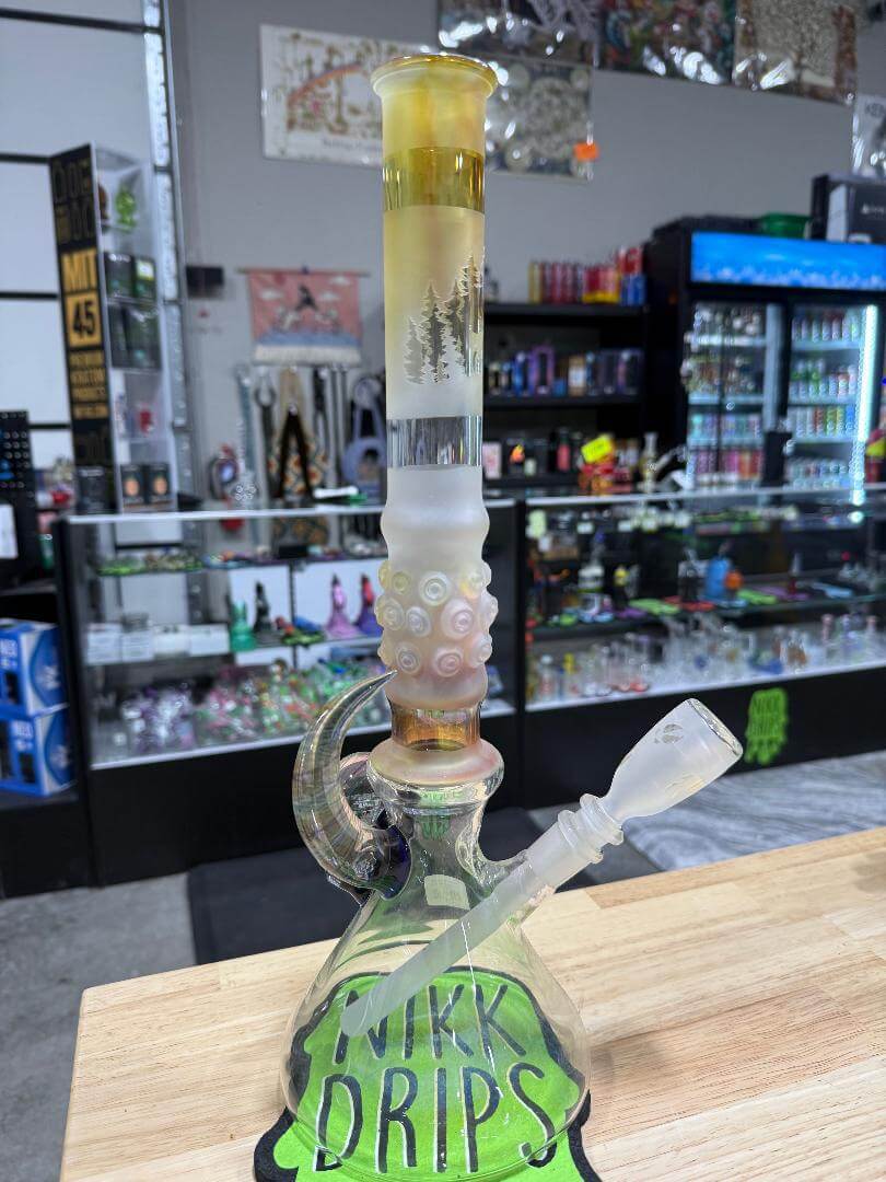 Brando Glass Flower Beaker - Sandblasted & Fumed Elk Forest Scene 14mm 45° displayed in a shop.