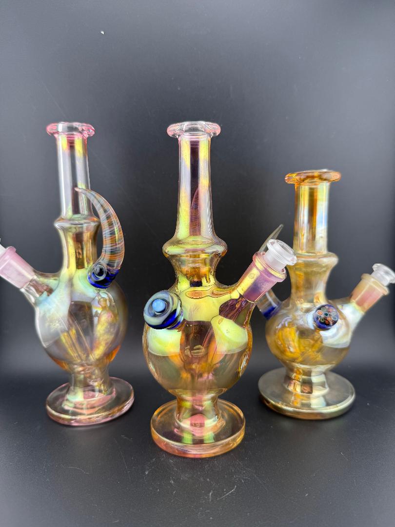 Brando Glass Fumed Orb Rig 10mm 45° - Artistic hand-blown pieces featuring vibrant colors and unique designs.