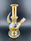 Brando Glass Fumed Orb Rig 10mm 45° with vibrant colors and intricate design, perfect for concentrate sessions.