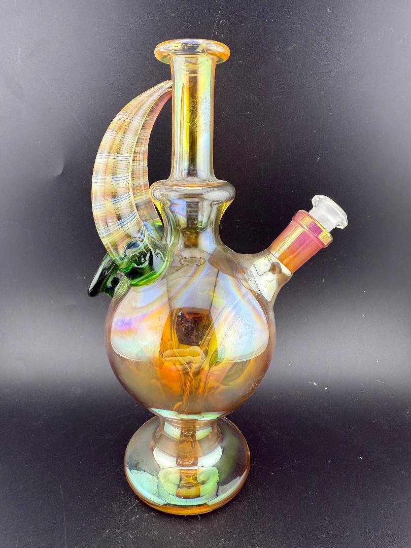 Brando Glass Horned Fumed Rig 10mm 90° with horned accents and vibrant color shifts, showcasing unique craftsmanship.