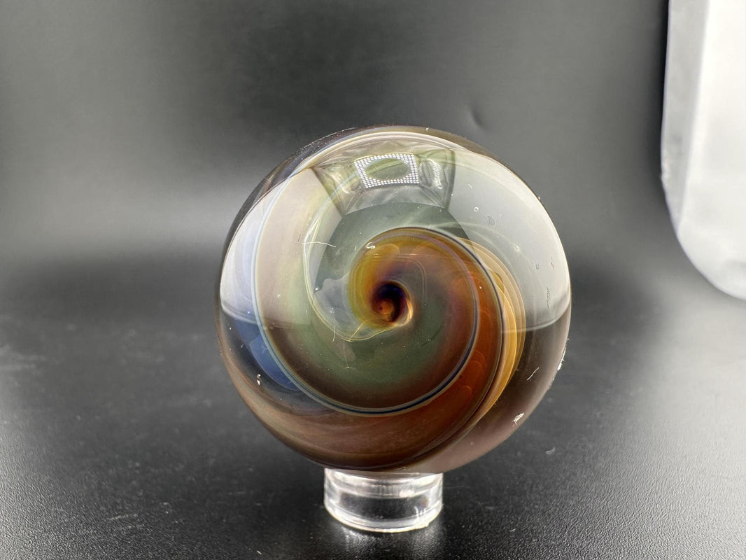 Brando Glass Large Marble - Swirled Backed Implosion showcasing intricate swirled design and implosion core.