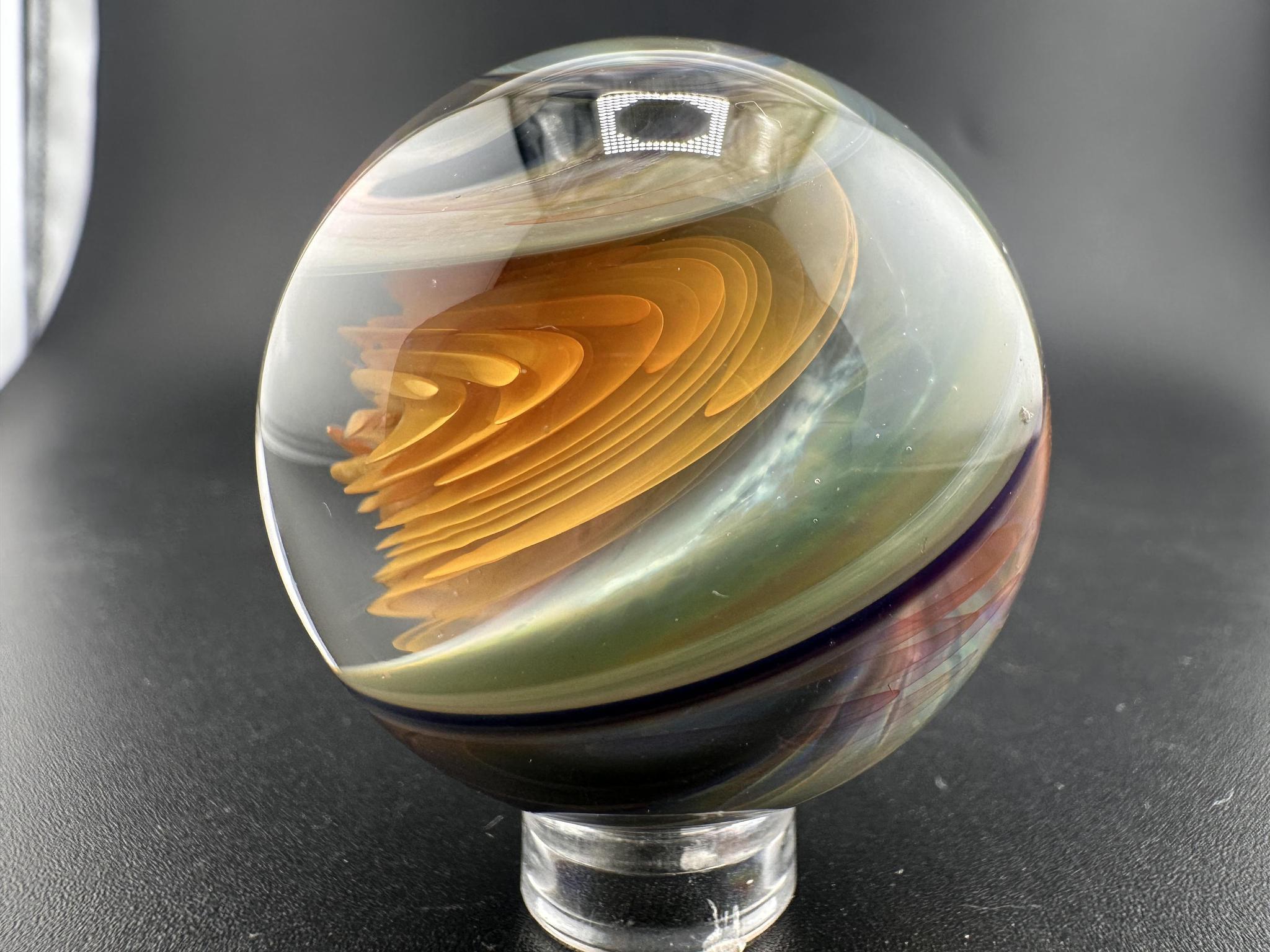 Brando Glass Large Marble - Swirled Backed Implosion showcasing intricate colors and implosion design.