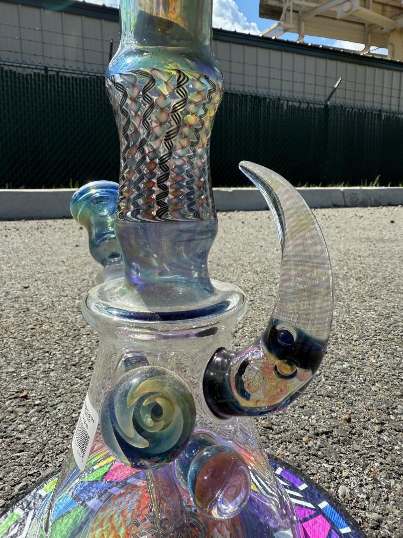 Brando Glass x Luke The Drifter 14mm beaker showcasing intricate colorwork and unique design features.