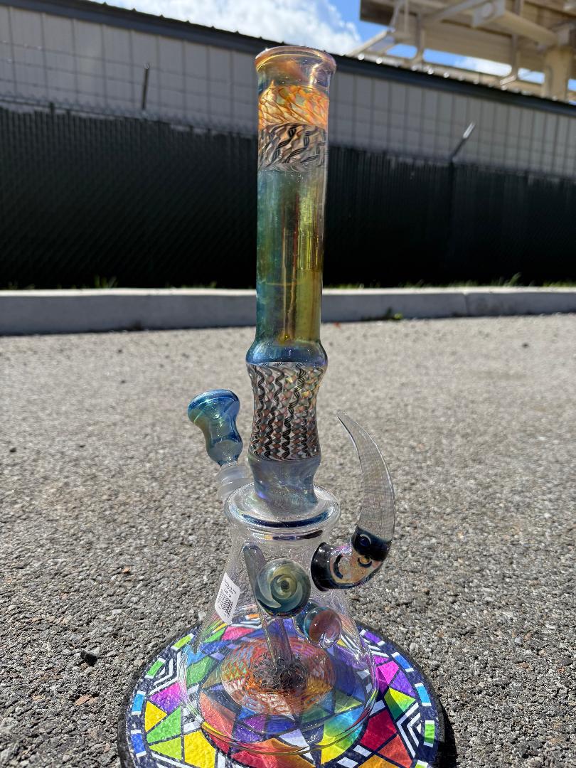 Brando Glass x Luke The Drifter 14mm beaker with vibrant colorwork and detailed linework, handcrafted in Spokane, WA.