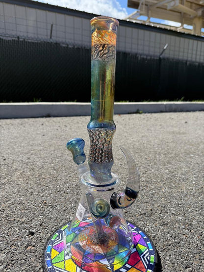 Brando Glass x Luke The Drifter 14mm beaker with vibrant colorwork and detailed linework, handcrafted in Spokane, WA.