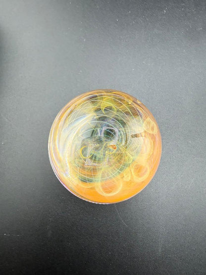 Brando Glass Marble - 16mm Triple Layer Fumed showcasing vibrant fumed colors and intricate design details.