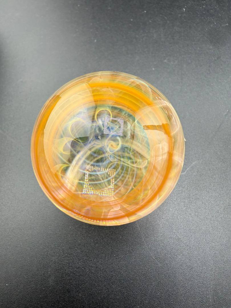 Brando Glass Marble - 16mm Triple Layer Fumed showcasing vibrant fumed colors and intricate design.