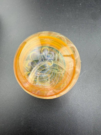 Brando Glass Marble - 16mm Triple Layer Fumed showcasing vibrant fumed colors and intricate design.