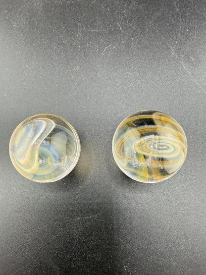 Brando Glass Marble - 21mm Fumed Slurper Top Marble showcasing swirling golden tones and elegant design.