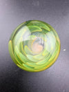 Brando Glass Marble - 30mm Fumed Implosion with dynamic green and yellow swirling design.