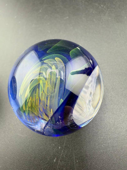 Brando Glass Marble - Double Vortex 1.4" - 1.6" showcasing intricate designs and vibrant colors.