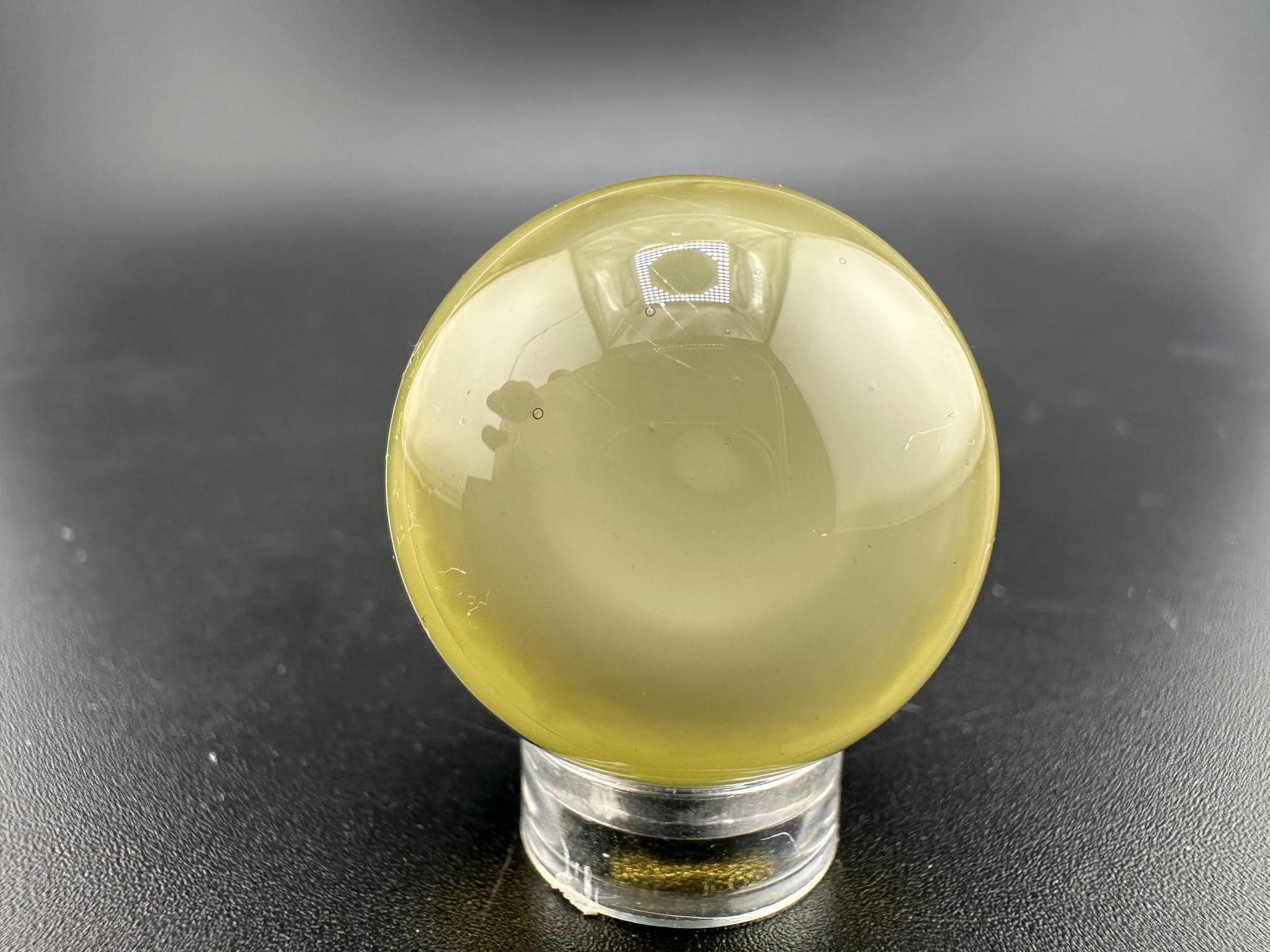 Brando Glass Marble - Enclamo showcasing vibrant layered design in high-quality borosilicate glass.