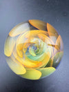 Brando Glass Marble - Fumed Implosion featuring a radiant spiral design and vibrant colors, handcrafted in Spokane, Washington.