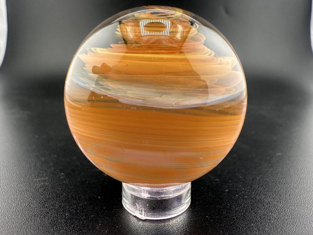 Brando Glass Marble - Fumed Swirl featuring stunning color-shifting swirls in a handcrafted 1-inch diameter design.