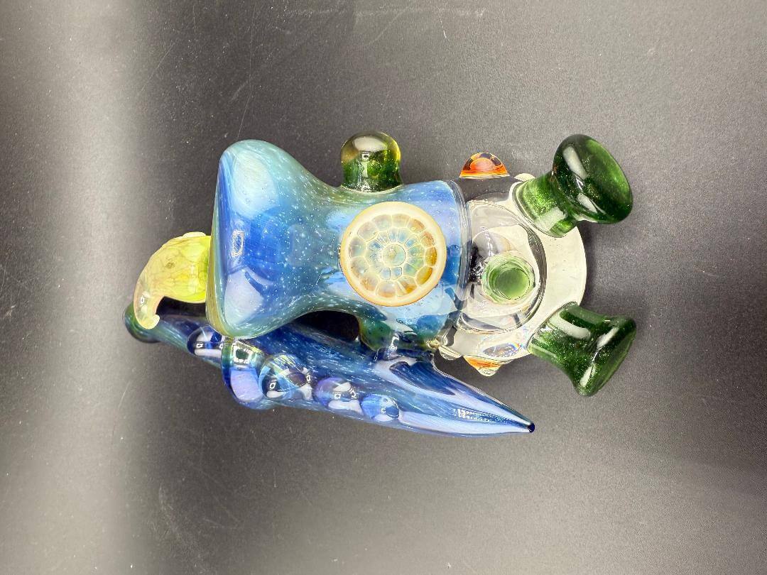 Brando Glass X Micahmazing Sidecar Pipe -Space Fume Tech & Liquid Filled showcasing bold colors and unique design.