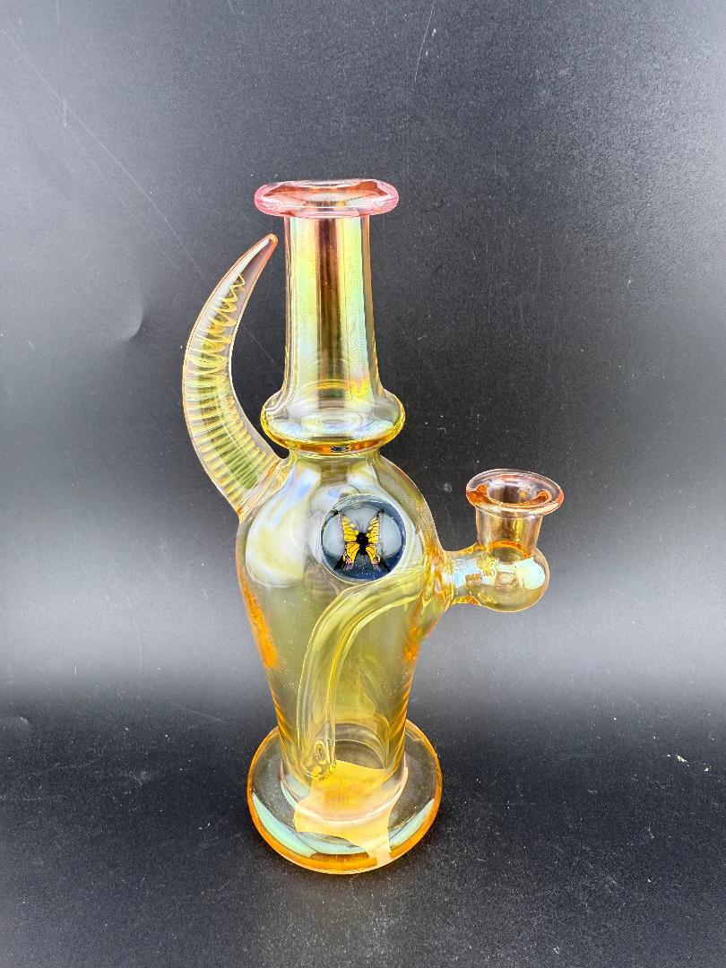 Brando Glass Mini Fumed Moon Shine Jug Rig 10mm 90° w/ Mille Attachment on black background.