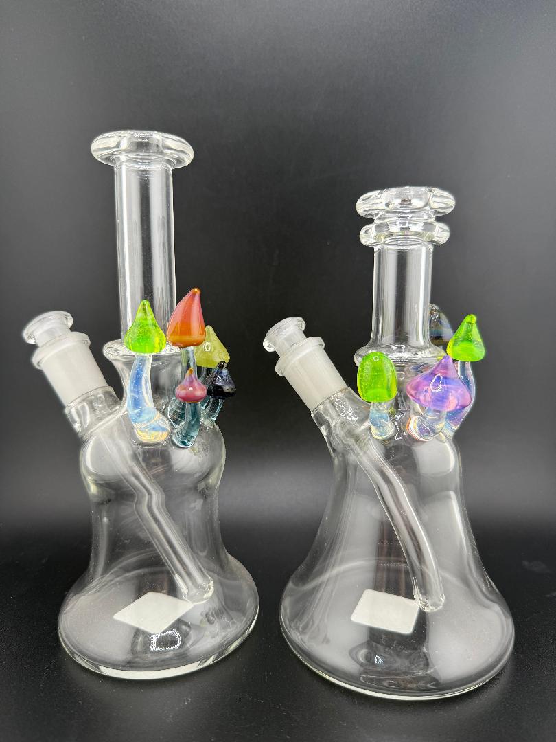 Brando Glass Mushroom Growth Banger Hanger Rig – 10mm 45° Joint featuring colorful mushroom accents and clear glass design.