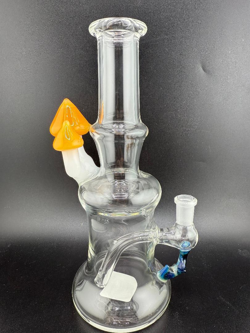 Brando Glass Mushroom Growth Banger Hanger Rig 10mm 90° with vibrant orange mushroom accents on clear glass.