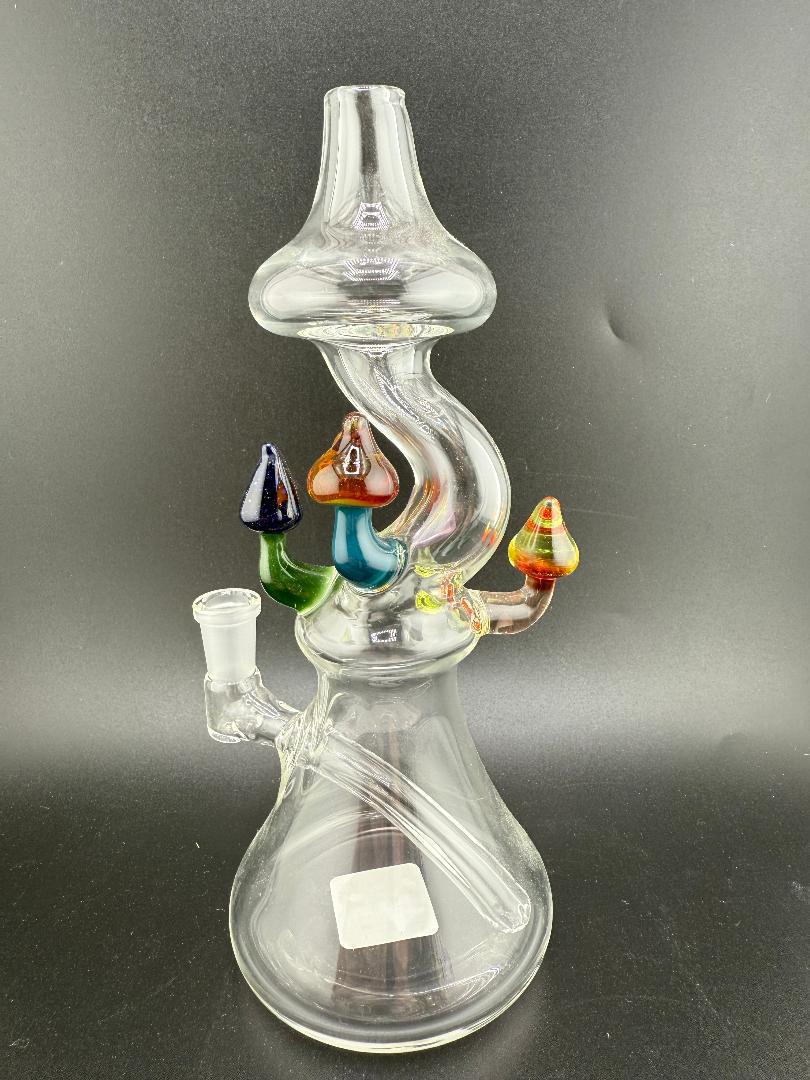 Brando Glass Mushroom Growth on Mushroom Rig 10mm 90°. Hand-blown glass rig with colorful mushroom accents.