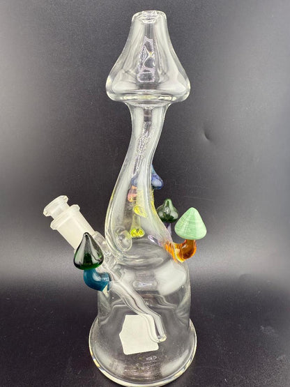 Brando Glass Mushroom Growth on Mushroom Rig – 10mm 45° showcasing clear glass design with colorful mushroom embellishments.