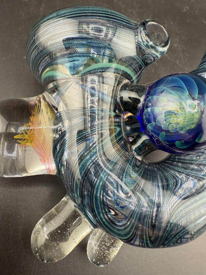 Brando Glass Sherlock Pipe - Blue & Teal UV Line Worked w Fumed Marbles showcasing intricate design and marbles.