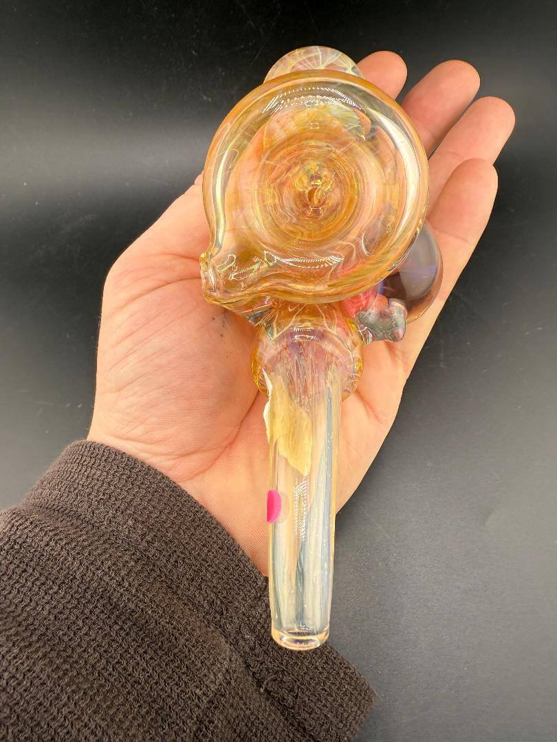 Brando Glass Sherlock Pipe - Gold Fumed w/ Fillacello Marble Attachments held in hand with vibrant colors and detail.