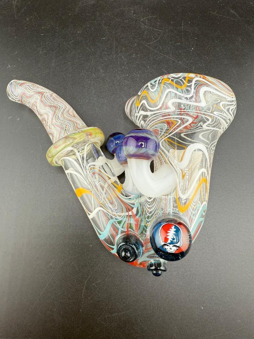 Brando Glass Sherlock Pipe - Multi Colored Linework w/ Mushroom & Grateful Dead Millie Attachment on a black background.